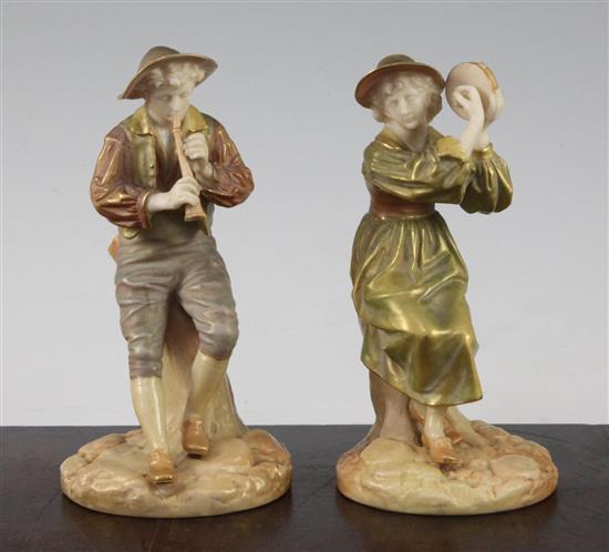 Two Royal Worcester shot enamels figures of a shepherd and shepherdess, modelled by James Hadley, 15.5cm and 15cm